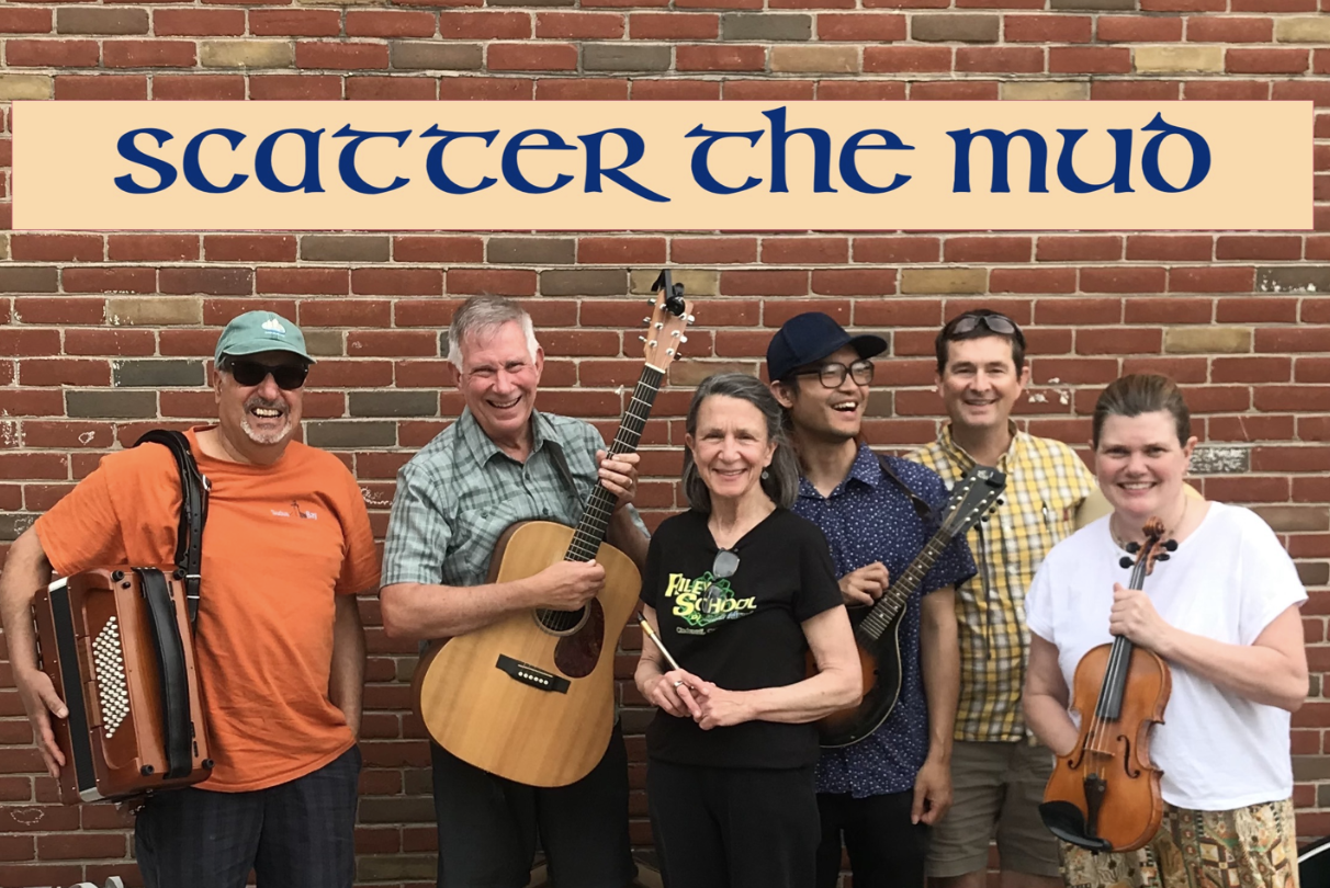 Scatter The Mud presents "Scatter The Cheer" - band mates holding instruments before a brick wall