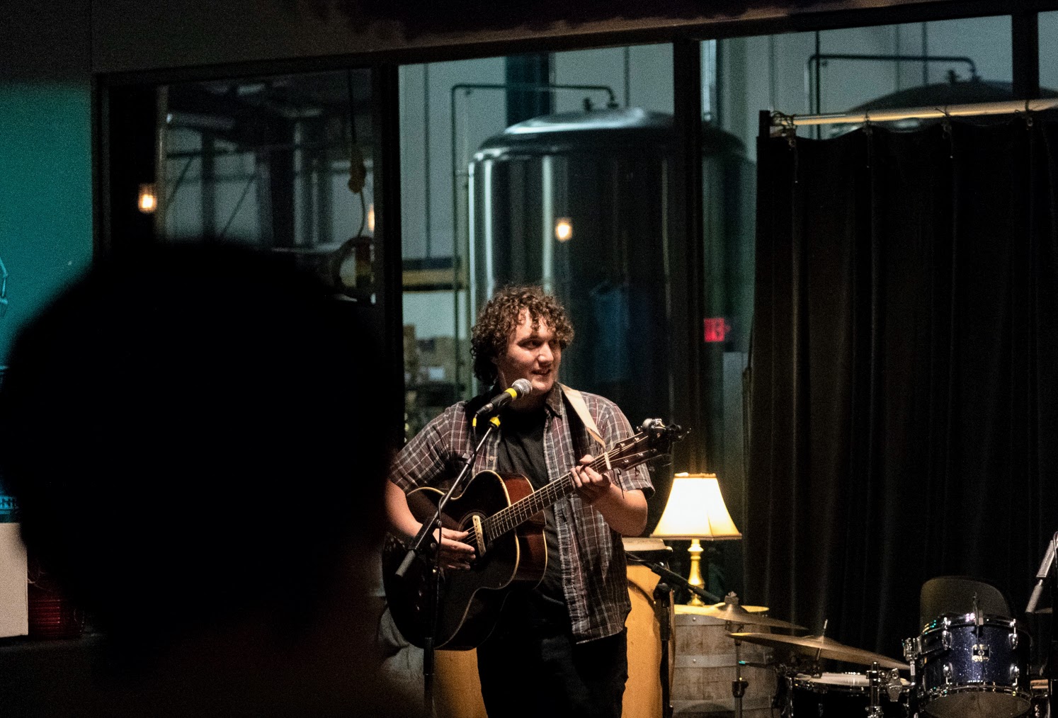 Tony Gill of Archimedes plays guitar